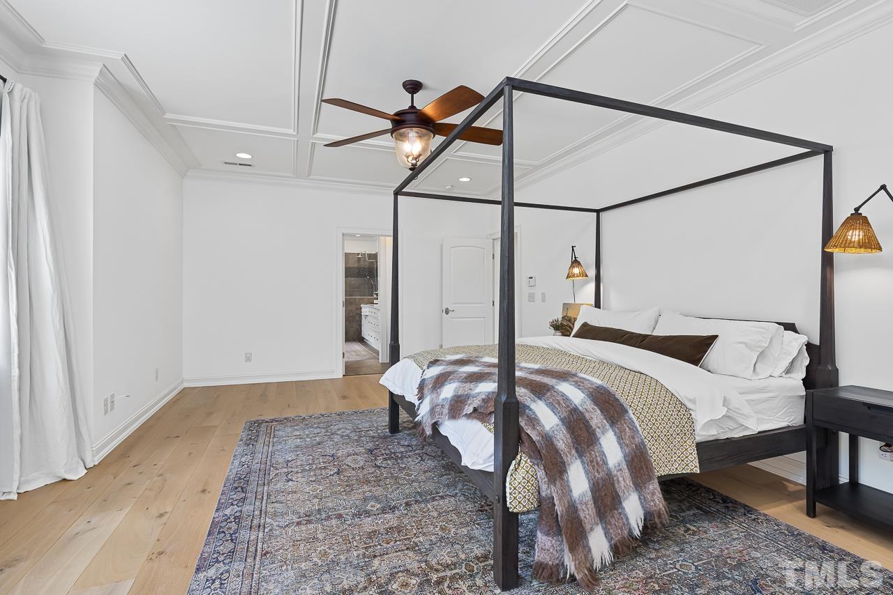 18 Crimson Oak Drive Durham, NC 27713 - Photo 39 of 87 a bedroom with a bed and a mirror