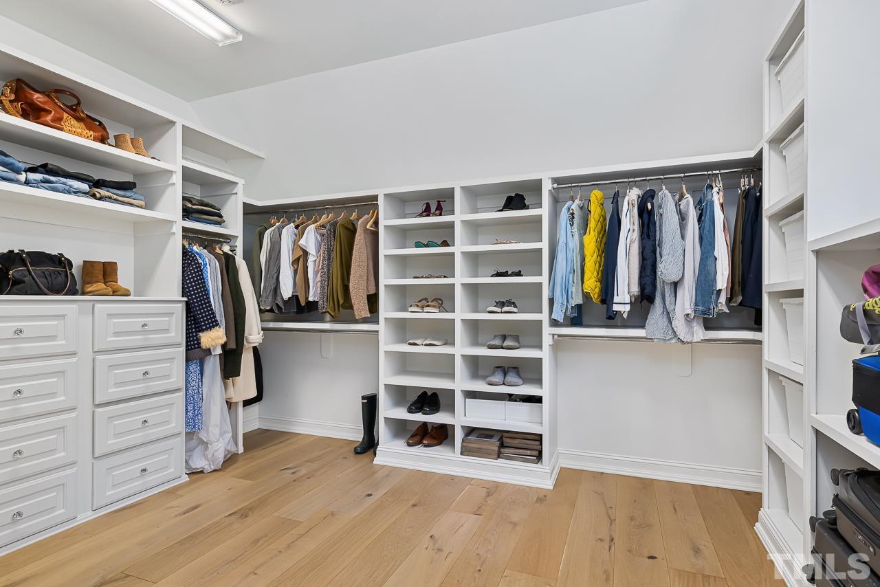 18 Crimson Oak Drive Durham, NC 27713 - Photo 46 of 87 a view of walk in closet with clothes and shoes