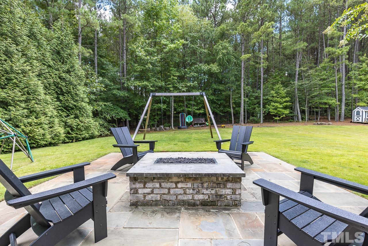 18 Crimson Oak Drive Durham, NC 27713 - Photo 49 of 87 a view of a swimming pool with a patio and a yard
