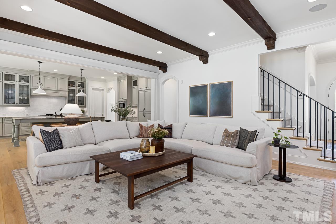 18 Crimson Oak Drive Durham, NC 27713 - Photo 5 of 87 a living room with furniture and a view of kitchen