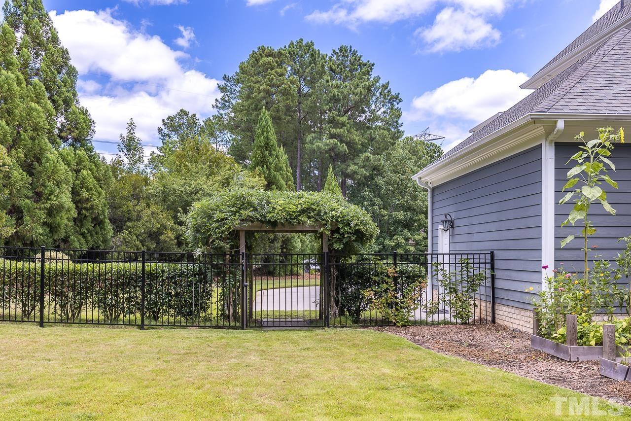 18 Crimson Oak Drive Durham, NC 27713 - Photo 55 of 87 a view of a house with backyard and sitting area
