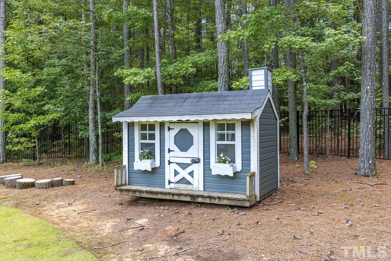 18 Crimson Oak Drive Durham, NC 27713 - Photo 57 of 87 a front view of a house with garden