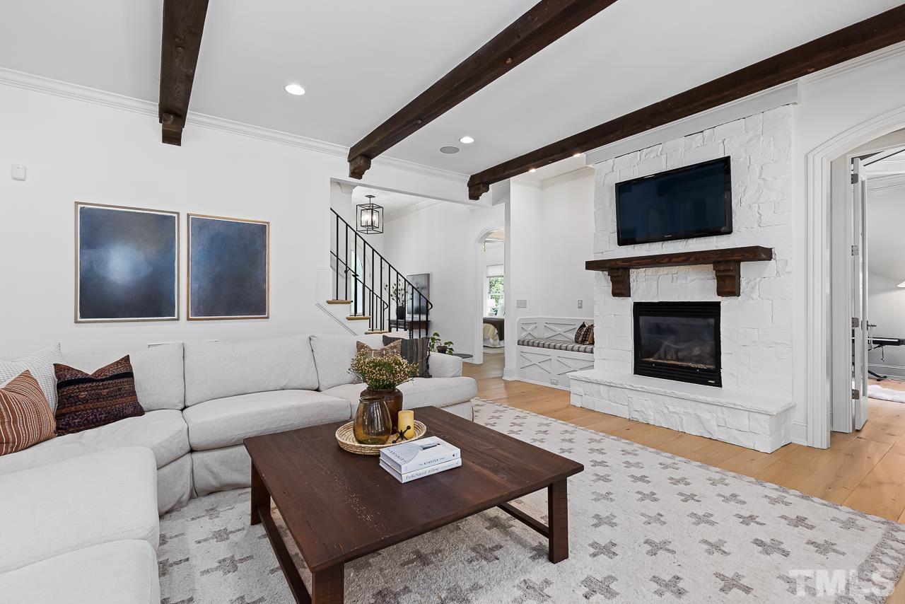 18 Crimson Oak Drive Durham, NC 27713 - Photo 6 of 87 a living room with furniture and a flat screen tv