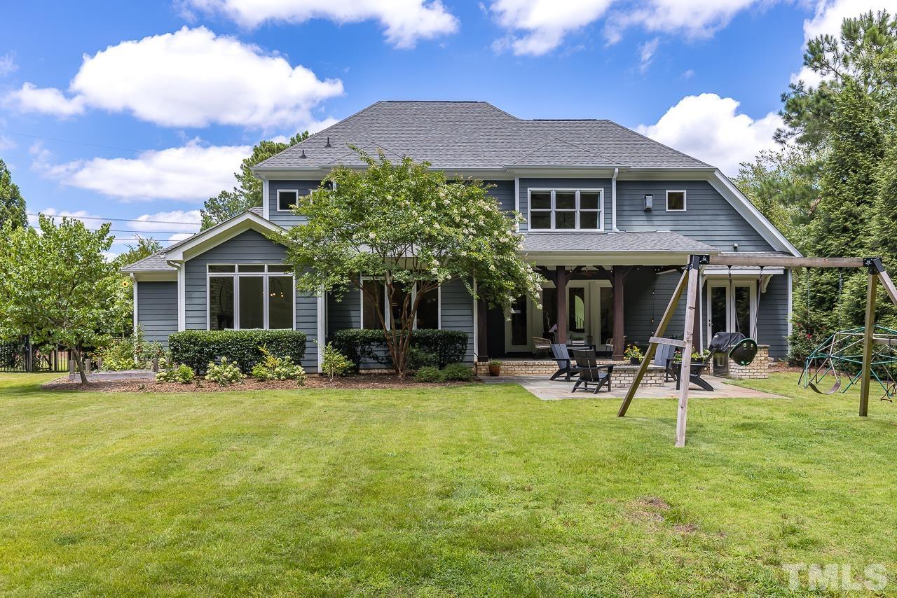 18 Crimson Oak Drive Durham, NC 27713 - Photo 61 of 87 a view of a house with a yard porch and sitting area