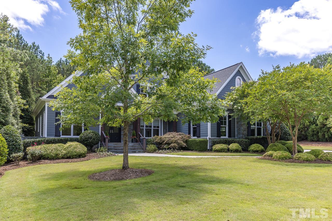 18 Crimson Oak Drive Durham, NC 27713 - Photo 82 of 87 a front view of a building with a garden