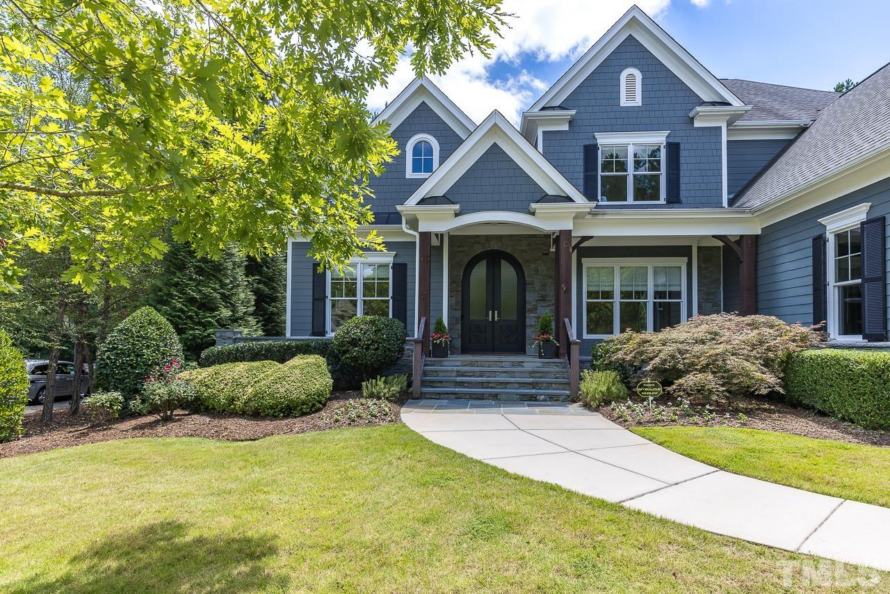 18 Crimson Oak Drive Durham, NC 27713 - Photo 84 of 87 a front view of a house with a garden