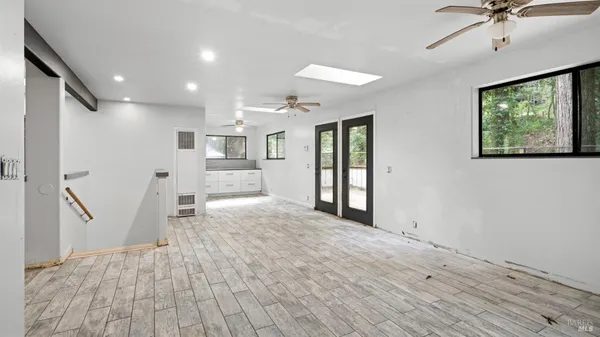 a view of kitchen with furniture and flat screen tv