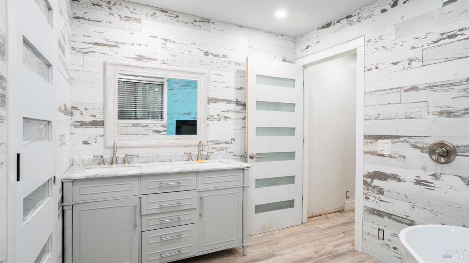11144 Ice Box Canyon Road Forestville, CA 95436 - Photo 17 of 38 a bathroom with a sink and a mirror