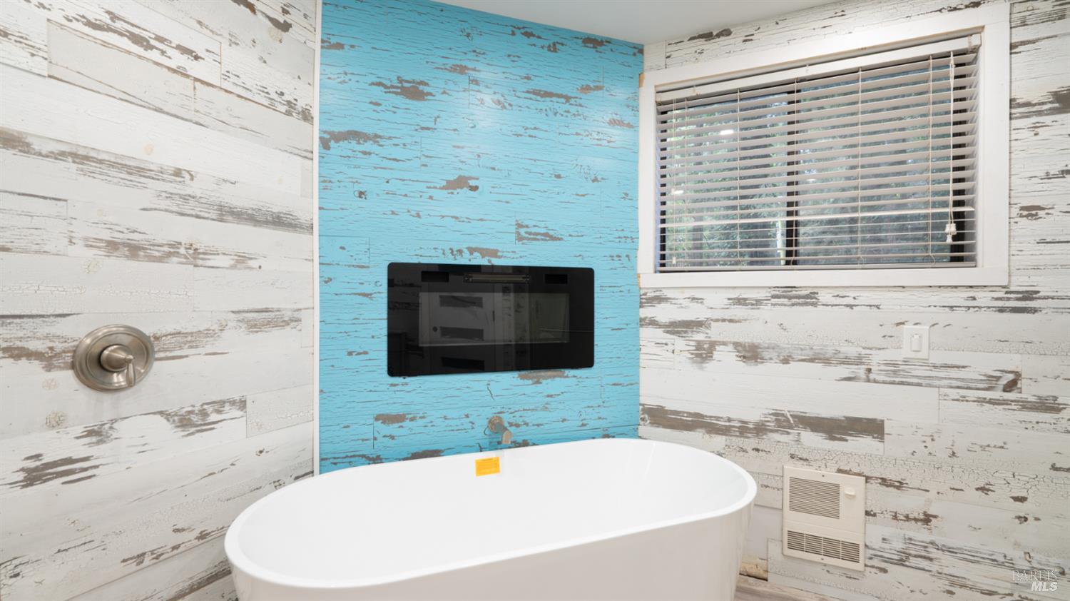 11144 Ice Box Canyon Road Forestville, CA 95436 - Photo 19 of 38 a bathroom with a tub a sink and a window