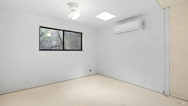 an empty room with a window