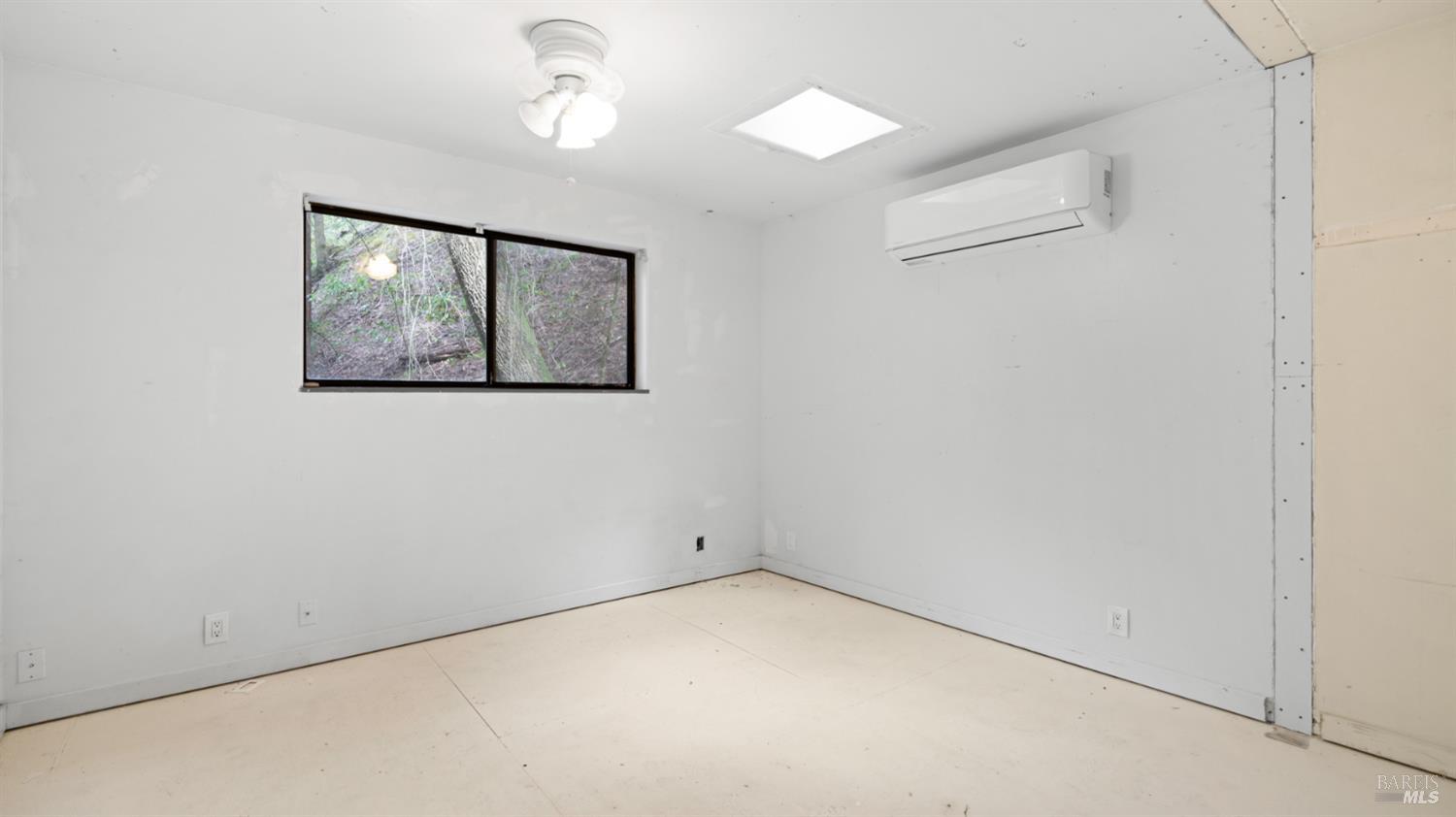 11144 Ice Box Canyon Road Forestville, CA 95436 - Photo 28 of 38 an empty room with a window