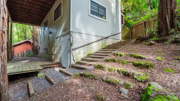 a view of backyard with green space