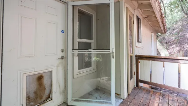 a view of a bathroom with a glass door