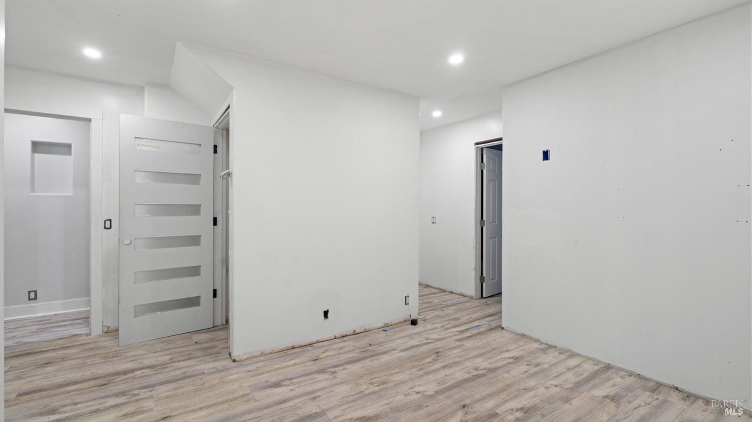 11144 Ice Box Canyon Road Forestville, CA 95436 - Photo 9 of 38 a view of an empty room with wooden floor