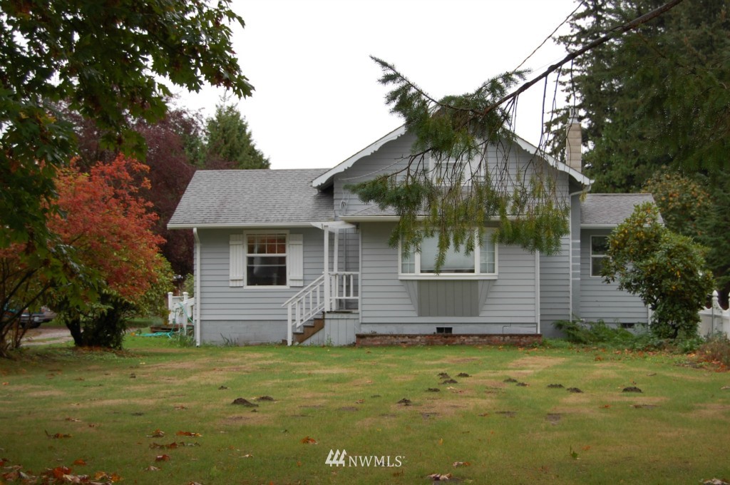 1769 Newkirk Road Ferndale, WA 98248 - Photo 1 of 8 a view of a house with a yard