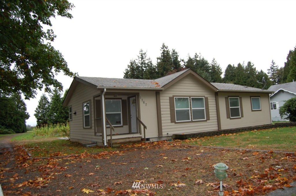 1769 Newkirk Road Ferndale, WA 98248 - Photo 3 of 8 a view of a house with a yard