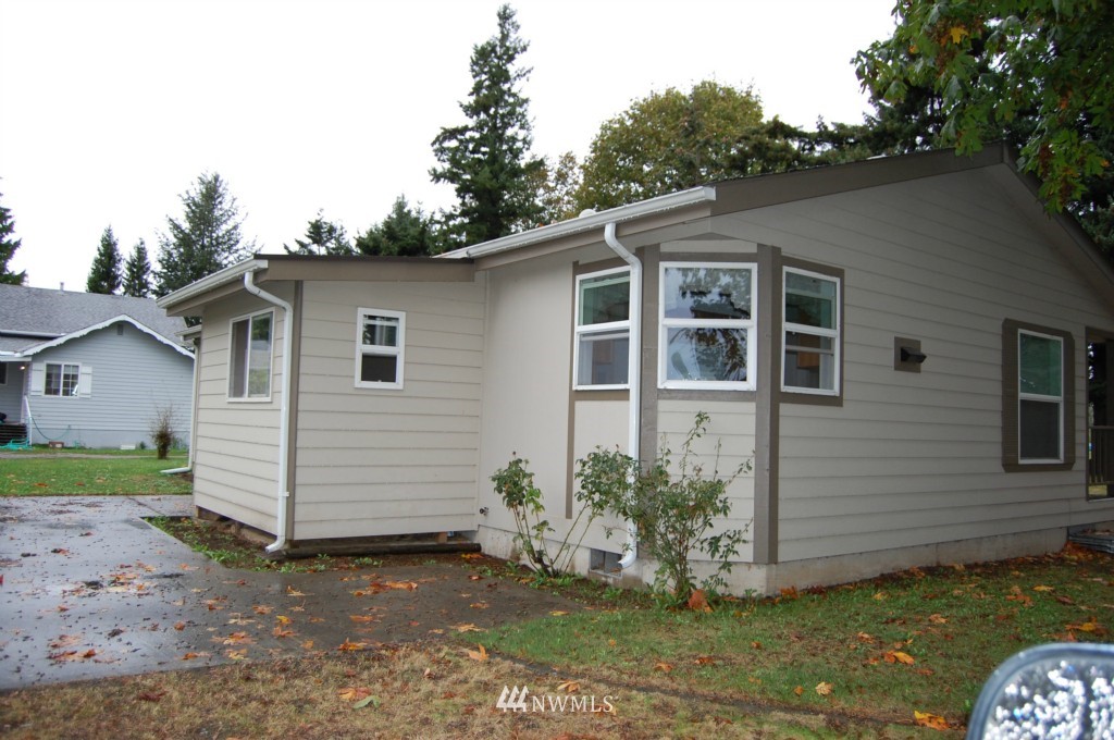 1769 Newkirk Road Ferndale, WA 98248 - Photo 4 of 8 a view of a house with a yard