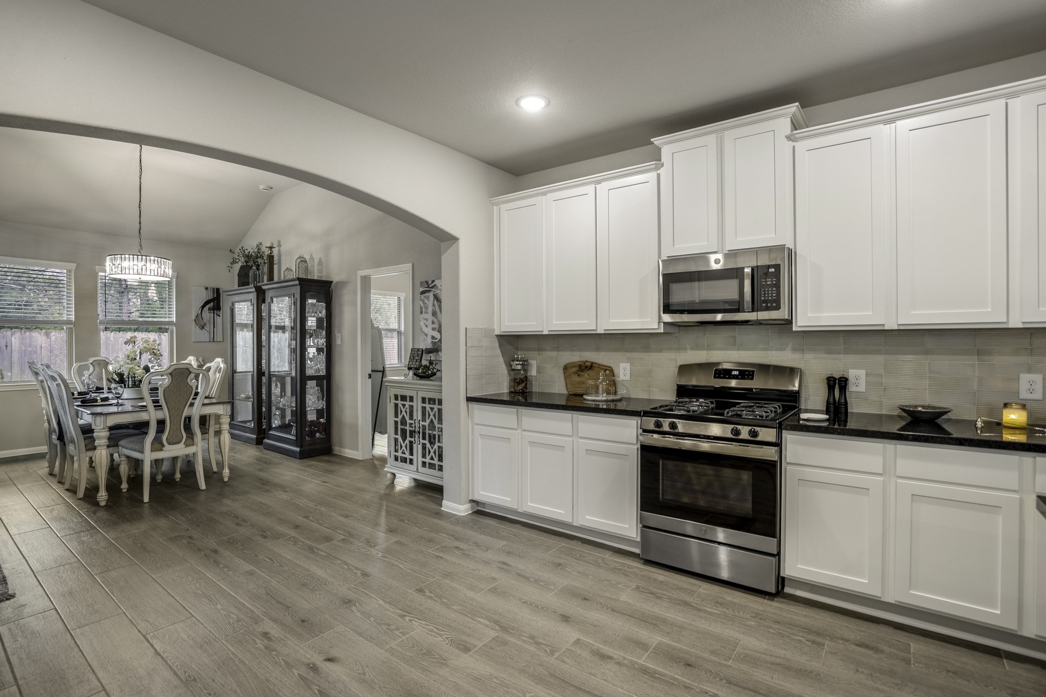 30391 Limber Pines Drive Magnolia, TX 77355 - Photo 24 of 49 Arched opening into the dining area adds character.
