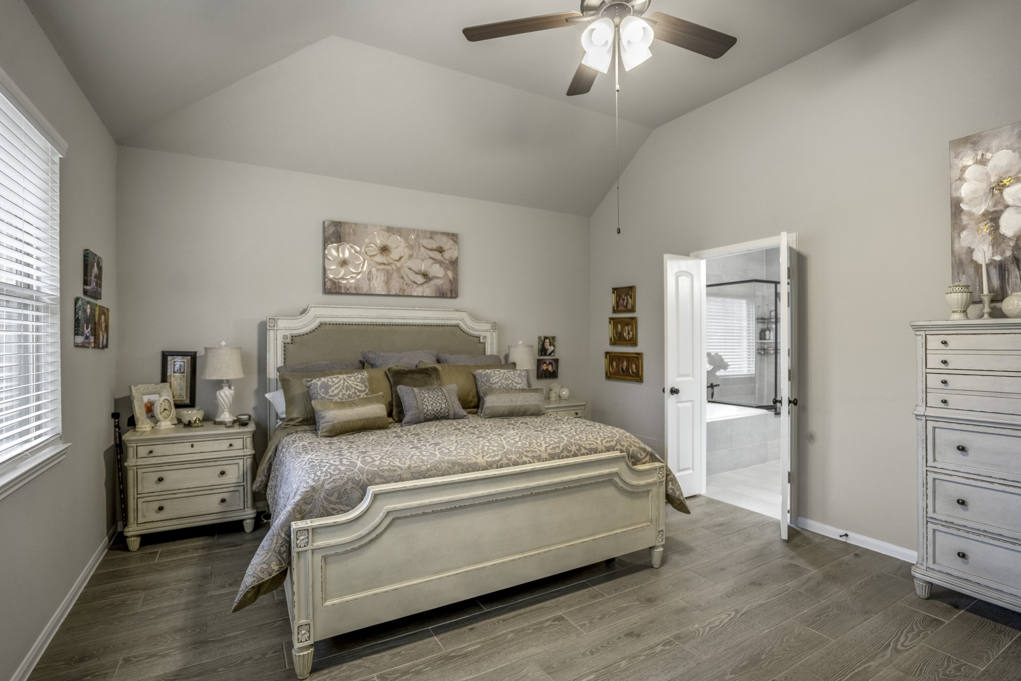 30391 Limber Pines Drive Magnolia, TX 77355 - Photo 29 of 49 This inviting primary bedroom features a cozy, elegant design with an ensuite for ultimate convenience and privacy.
