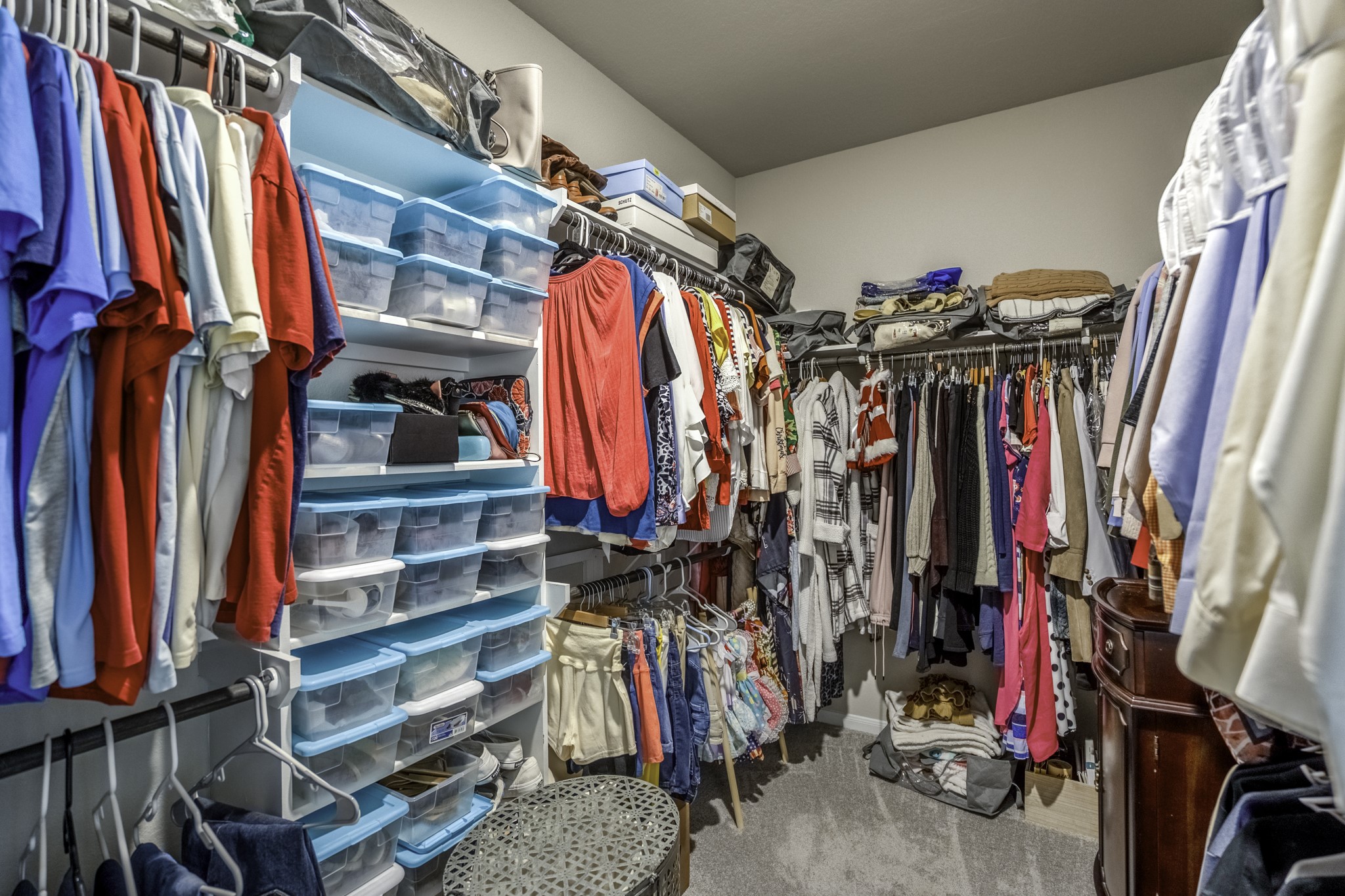 30391 Limber Pines Drive Magnolia, TX 77355 - Photo 35 of 49 Experience ultimate convenience and luxury with this spacious walk-in closet directly accessible from the primary bathroom, perfect for organizing your wardrobe effortlessly.