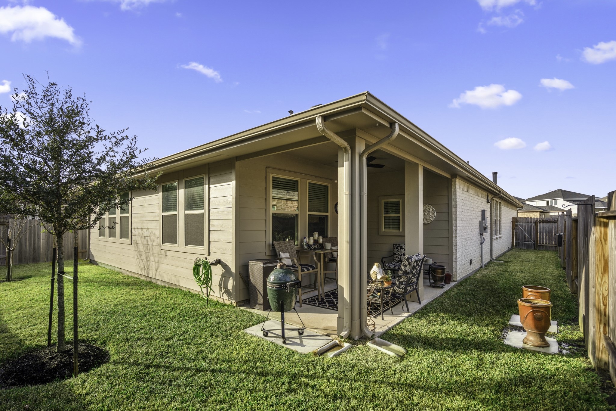 30391 Limber Pines Drive Magnolia, TX 77355 - Photo 41 of 49 Discover the charm of this cozy home featuring a delightful L-shaped yard, perfect for relaxing and entertaining.