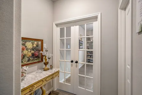a view of a livingroom with shelves