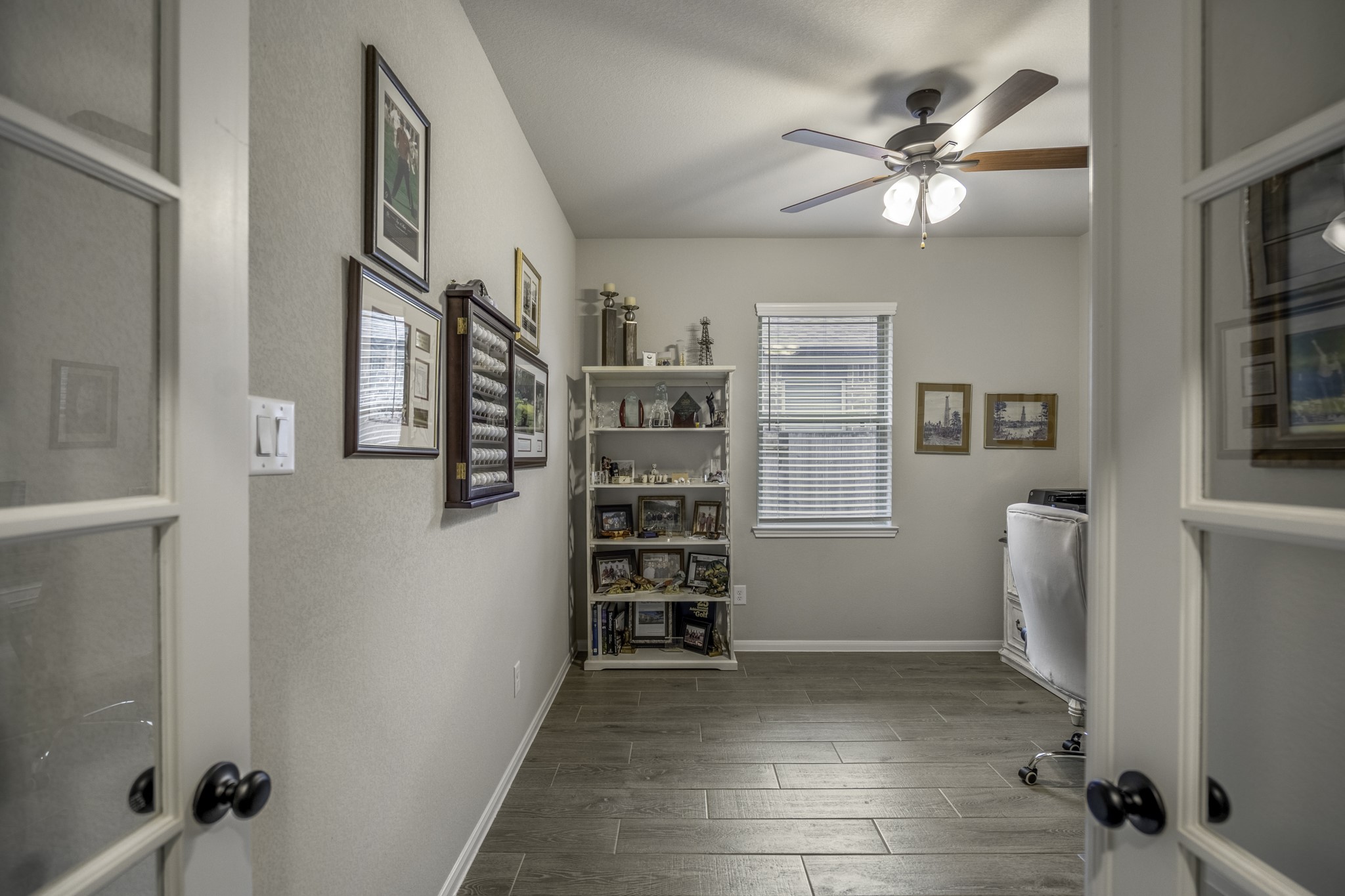 30391 Limber Pines Drive Magnolia, TX 77355 - Photo 10 of 49 Step into a bright and inviting office through elegant French doors, perfect for productivity and inspiration.