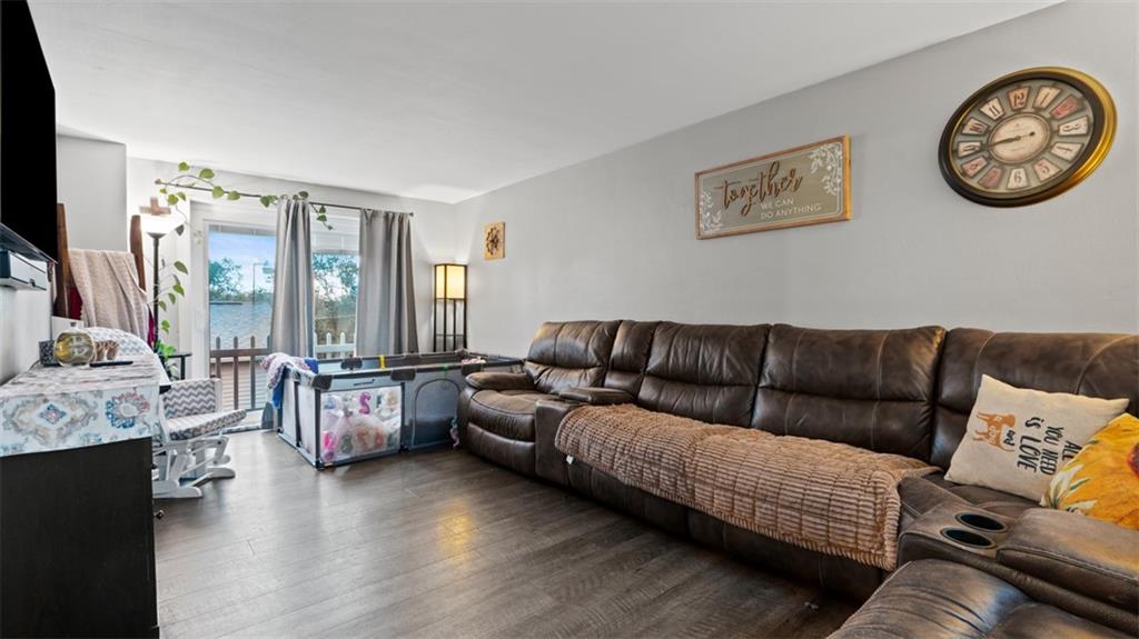 300 Sunset Boulevard Washington, PA 15301 - Photo 16 of 38 a living room with furniture and a flat screen tv