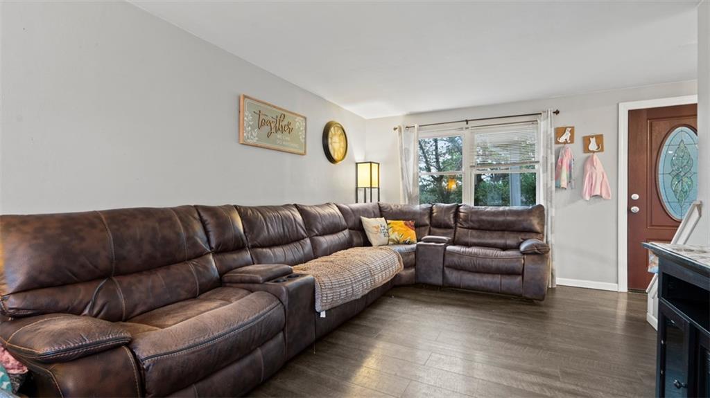 300 Sunset Boulevard Washington, PA 15301 - Photo 18 of 38 a living room with furniture and a flat screen tv