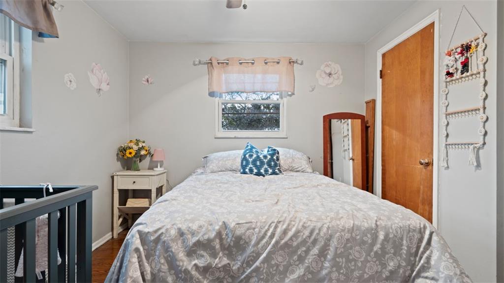 300 Sunset Boulevard Washington, PA 15301 - Photo 24 of 38 a bedroom with a bed and a dresser with a bookshelf