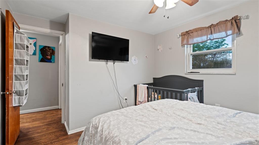 300 Sunset Boulevard Washington, PA 15301 - Photo 25 of 38 a bedroom with a bed and a flat screen tv