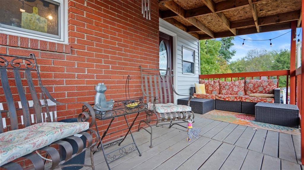 300 Sunset Boulevard Washington, PA 15301 - Photo 29 of 38 a balcony with wooden floor