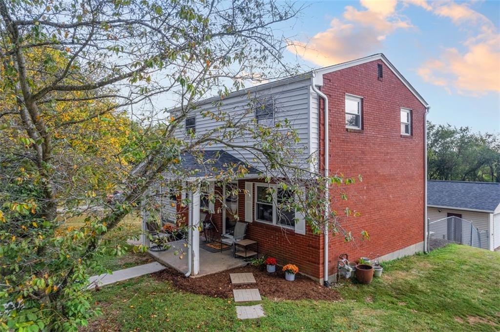 300 Sunset Boulevard Washington, PA 15301 - Photo 3 of 38 front view of a house with a yard