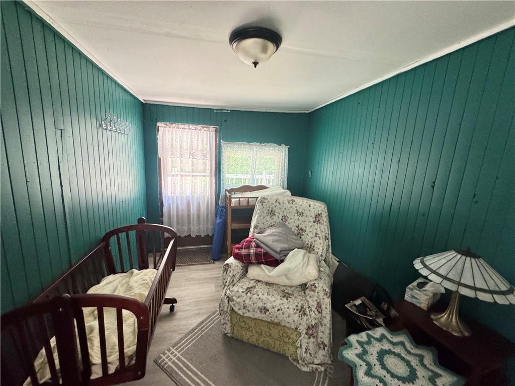 21 South Round Street New Castle, PA 16101 - Photo 5 of 6 a living room with furniture and a window