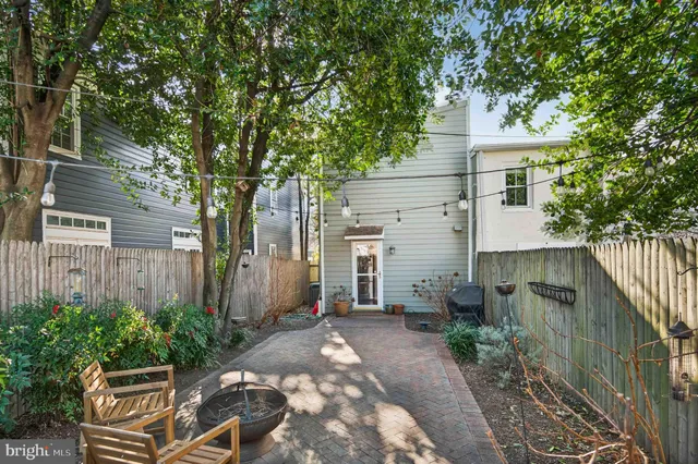 a view of a patio in backyard