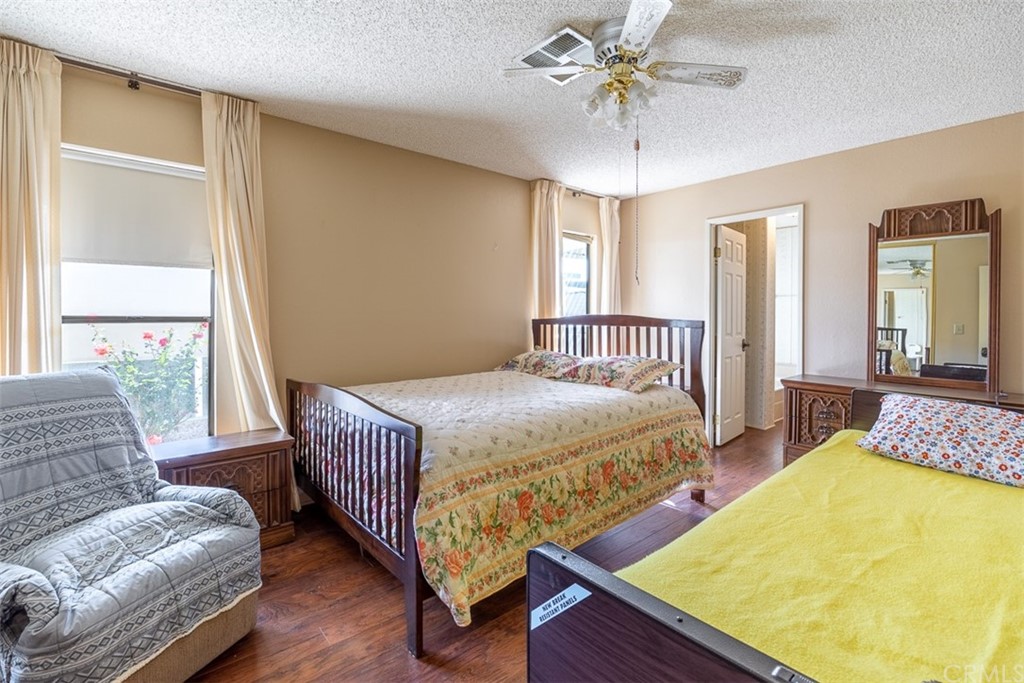 24600 Mountain Avenue, Unit 57 Hemet, CA 92544 - Photo 12 of 20 a bedroom with bed and window