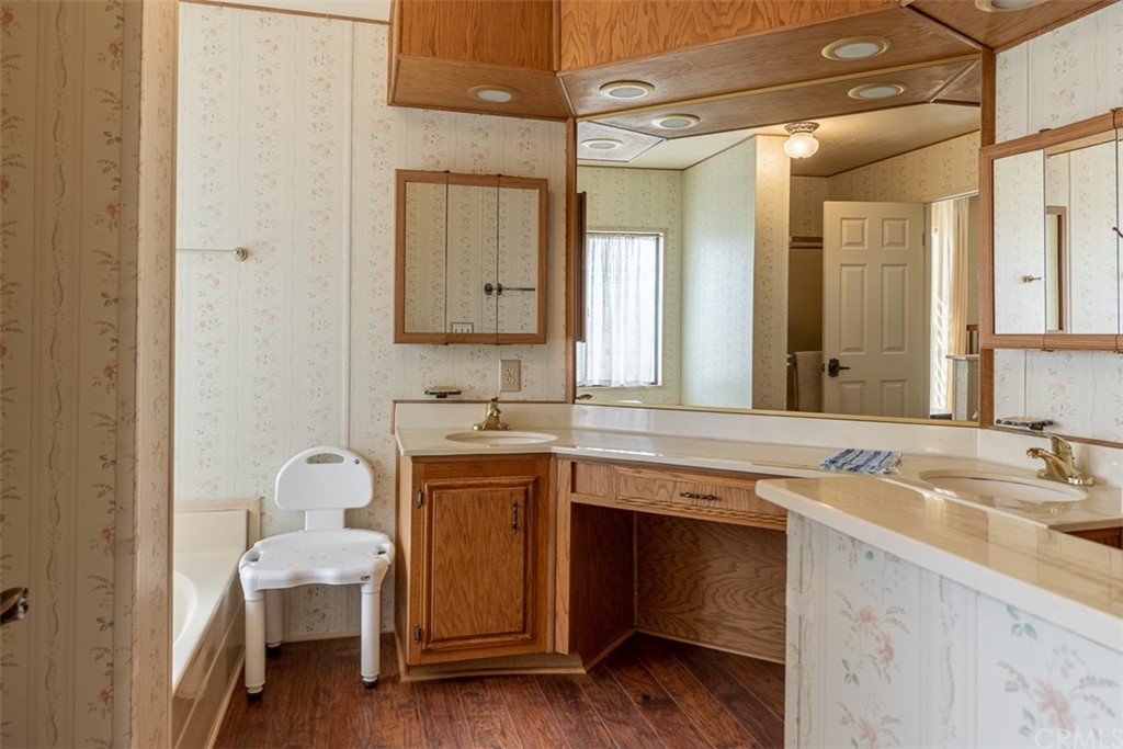 24600 Mountain Avenue, Unit 57 Hemet, CA 92544 - Photo 13 of 20 a view of bathroom with dual sinks