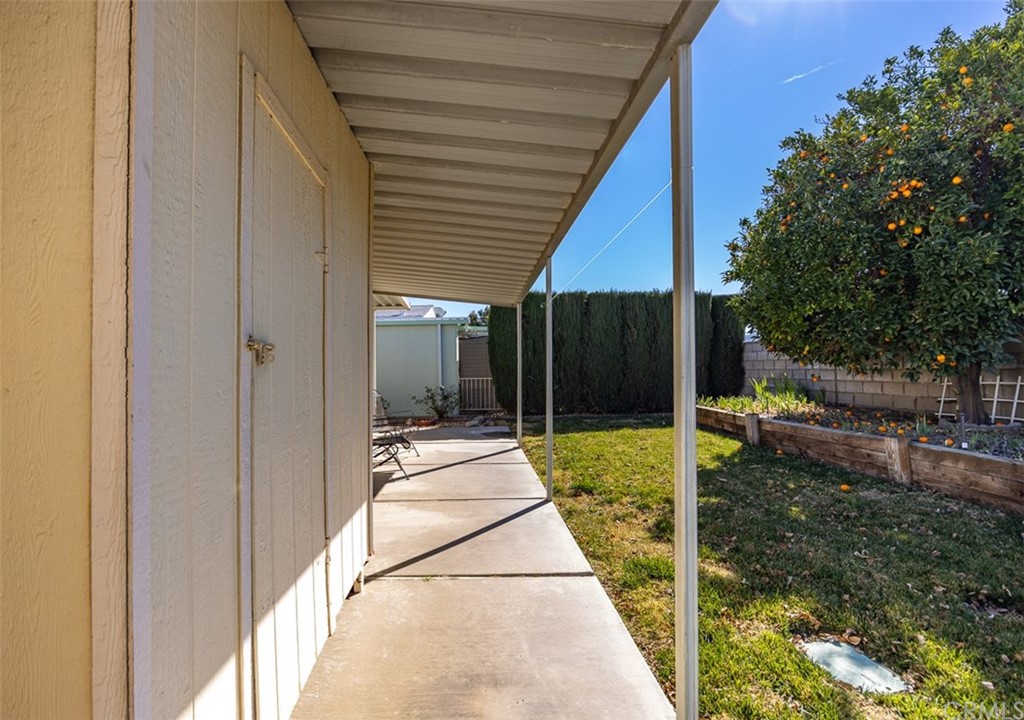 24600 Mountain Avenue, Unit 57 Hemet, CA 92544 - Photo 17 of 20 a backyard of a house with seating space