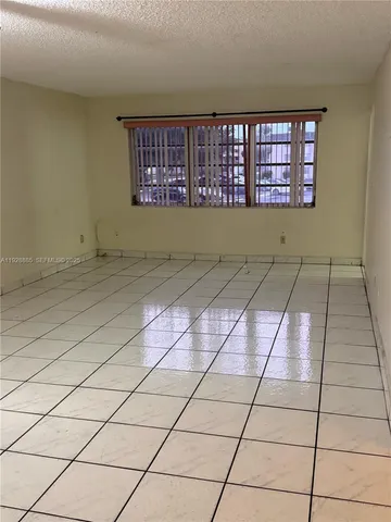 a view of a windows and an empty room