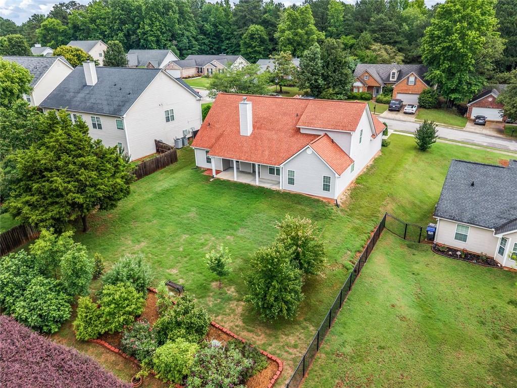 241 Red Bud Road Jefferson, GA 30549 - Photo 42 of 43 an aerial view of a house with garden space and street view