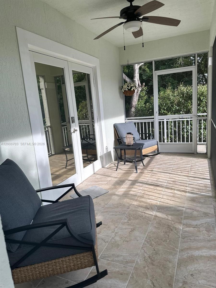 1019 Snapper Lane Key Largo, FL 33037 - Photo 12 of 37 a living room with furniture