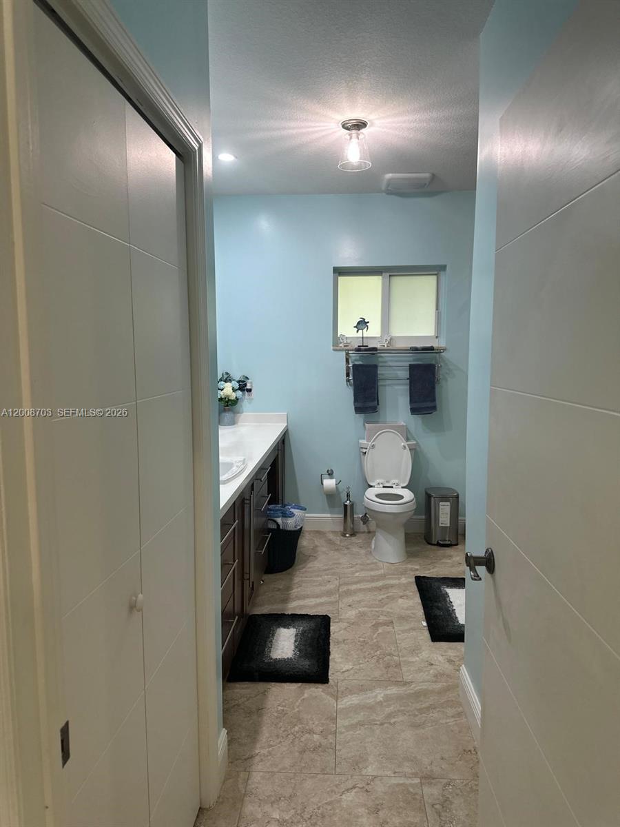 1019 Snapper Lane Key Largo, FL 33037 - Photo 25 of 37 a bathroom with a sink and a mirror