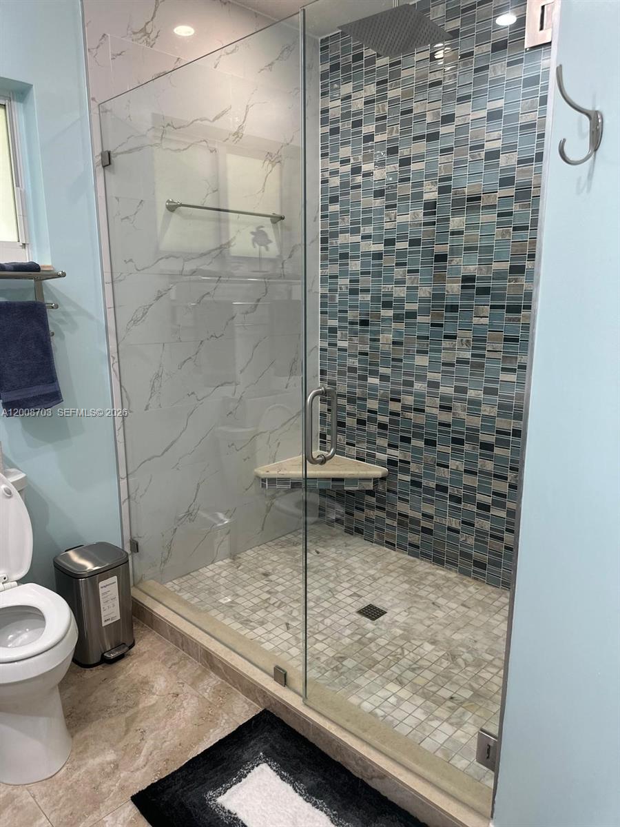 1019 Snapper Lane Key Largo, FL 33037 - Photo 27 of 37 a bathroom with a shower