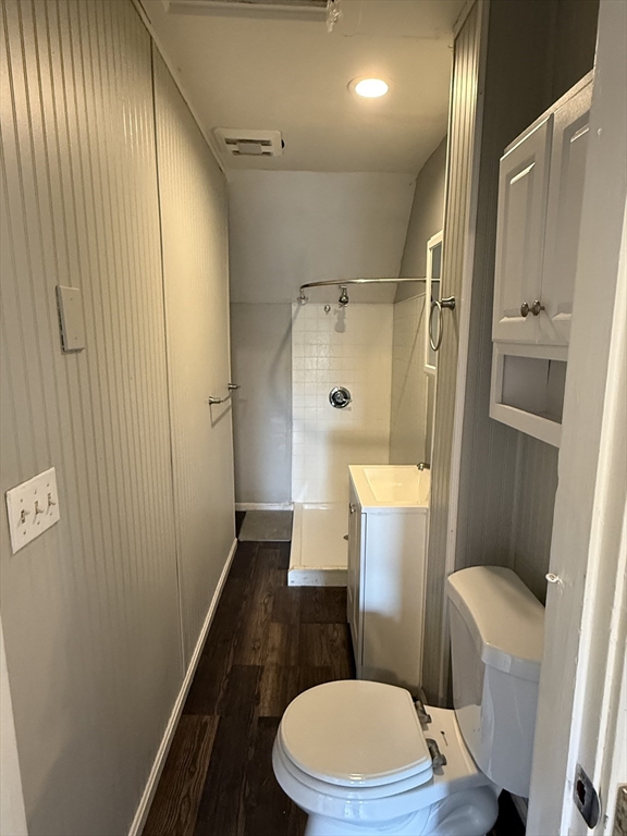 5 Arbor Vitae Street, Unit 2 Worcester, MA 01603 - Photo 8 of 12 a bathroom with a toilet and a shower