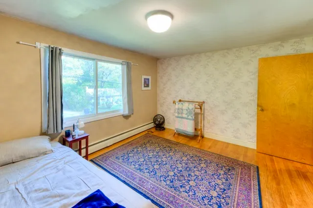 a living room with a rug