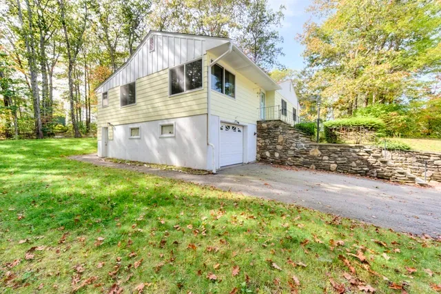 a view of a back yard of the house