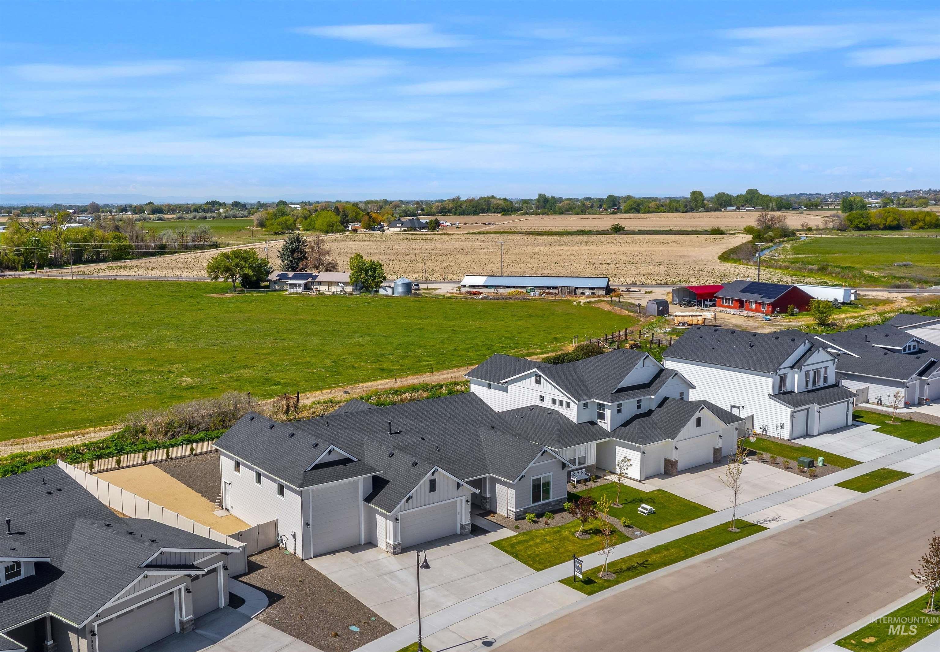 12557 West Wayfaring Drive Star, ID 83669 - Photo 1 of 25 Newly constructed residences featuring contemporary exterior facades