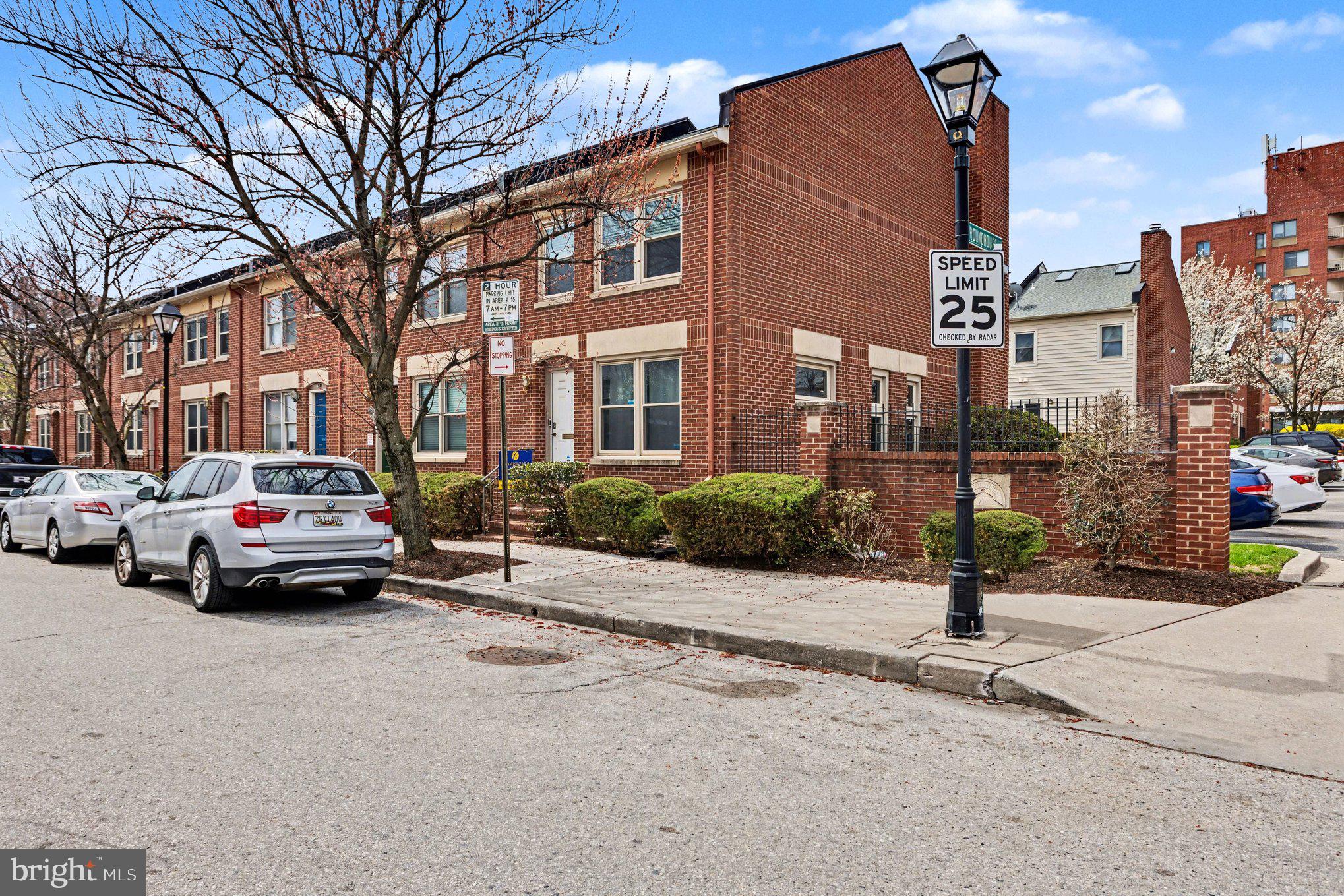 216 Scott Street Baltimore, MD 21230 - Photo 1 of 27 a view of street with parked cars