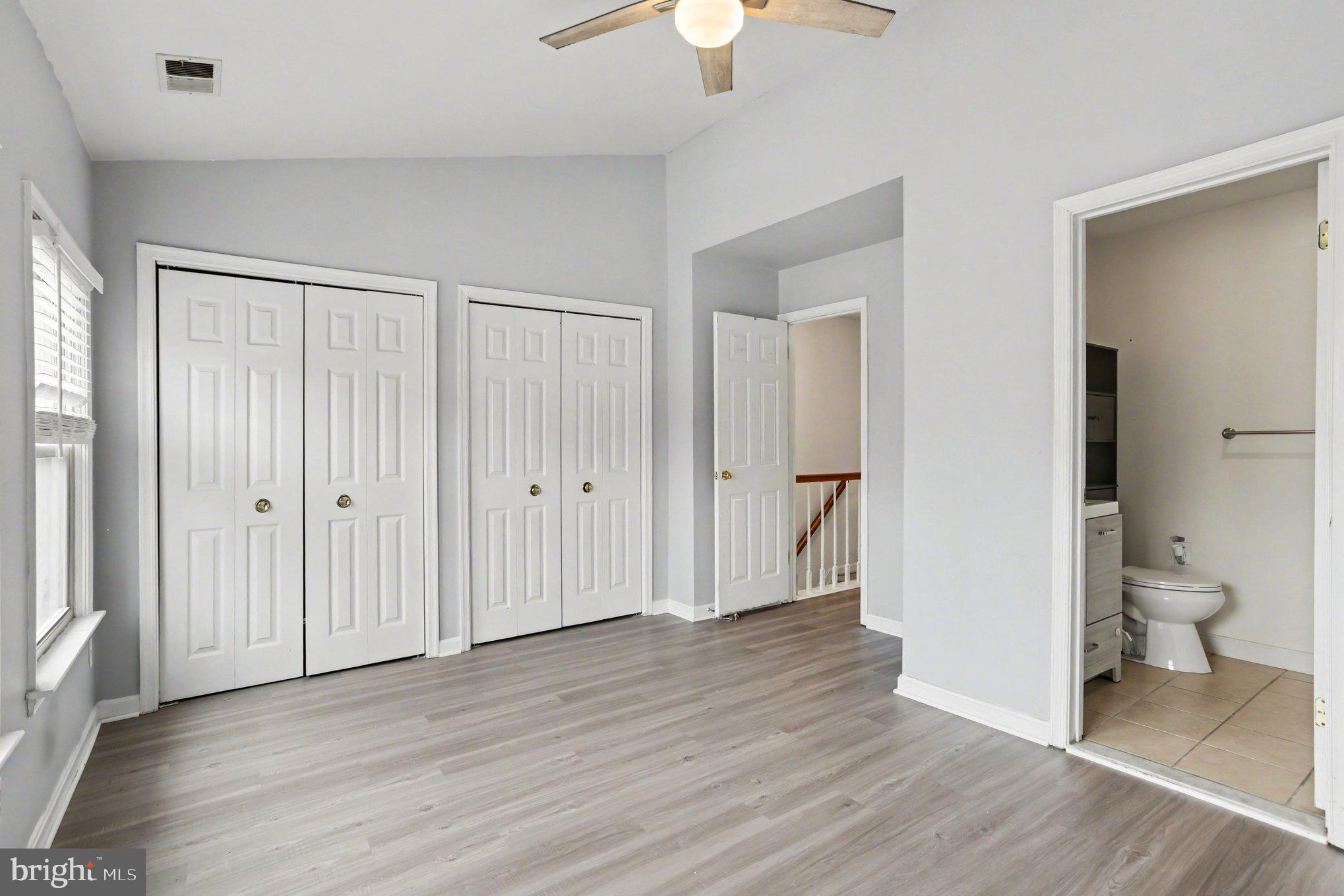 216 Scott Street Baltimore, MD 21230 - Photo 15 of 27 a view of a room with wooden floor and a bathroom