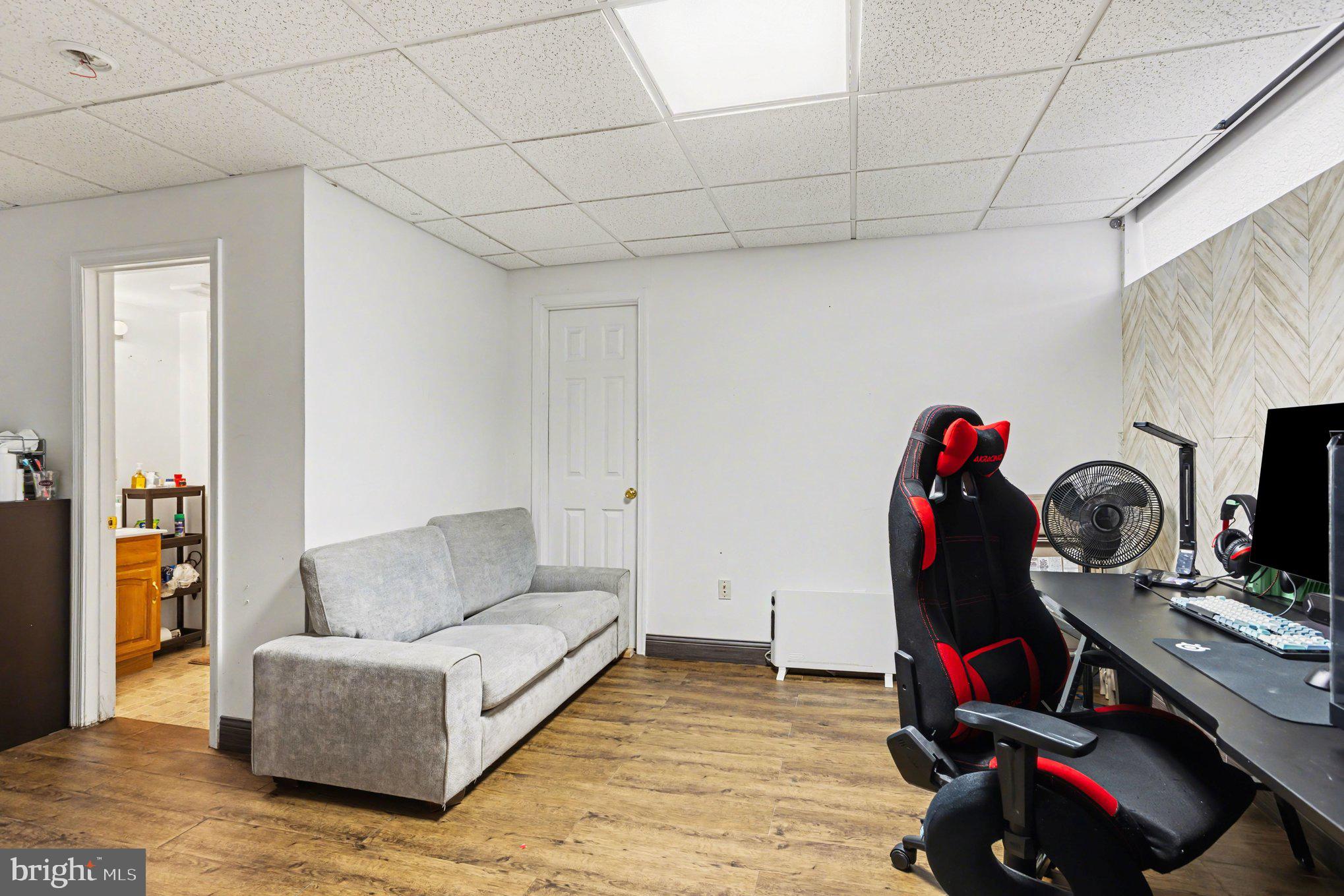 216 Scott Street Baltimore, MD 21230 - Photo 20 of 27 a living room with furniture and wooden floor
